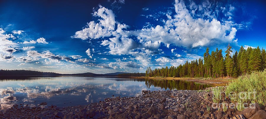 Cobalt Stillness, Panoramic Lake Under Towering Clouds by Omaste Witkowski